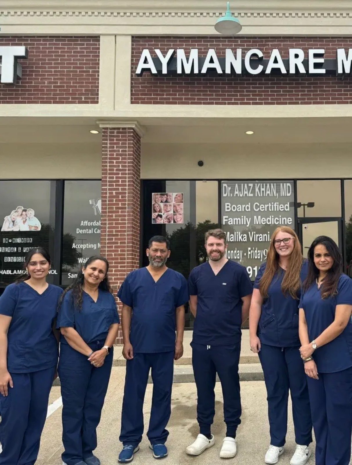 The AymanCare team outside our clinic